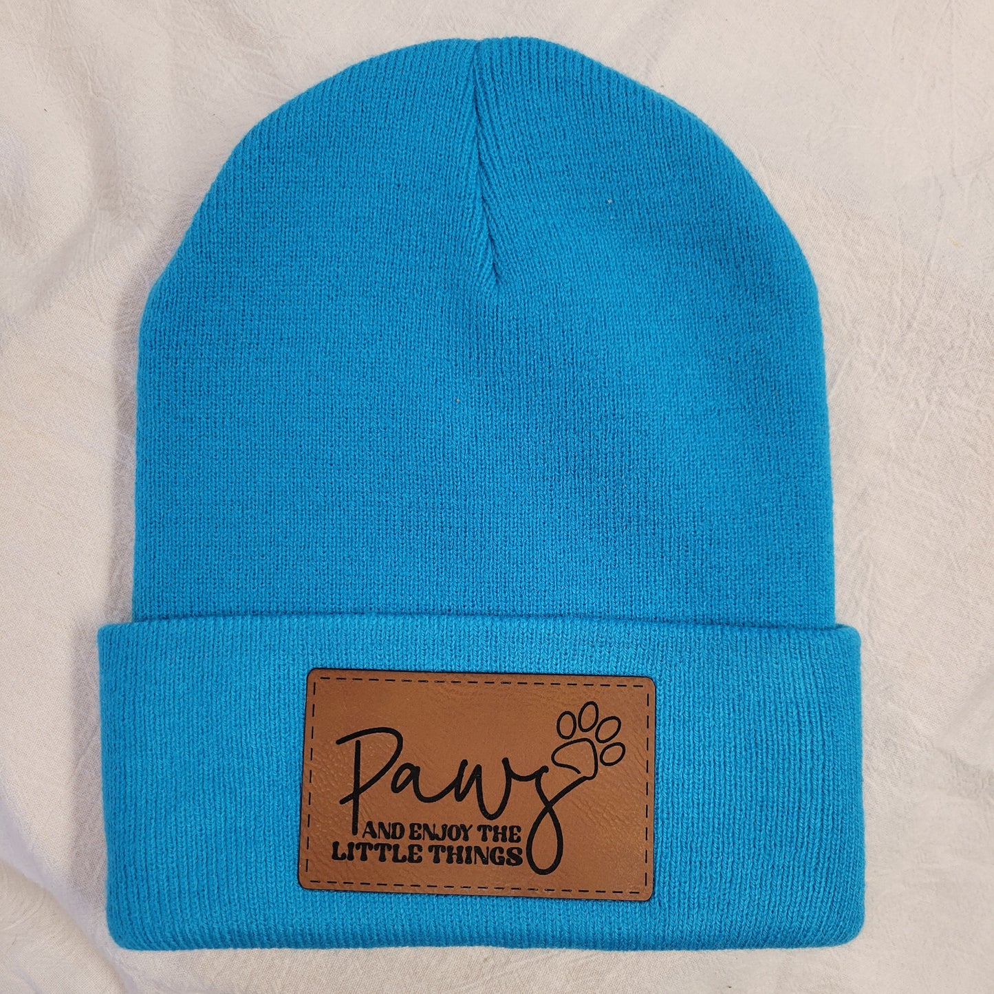 Beanies with pet quote patches