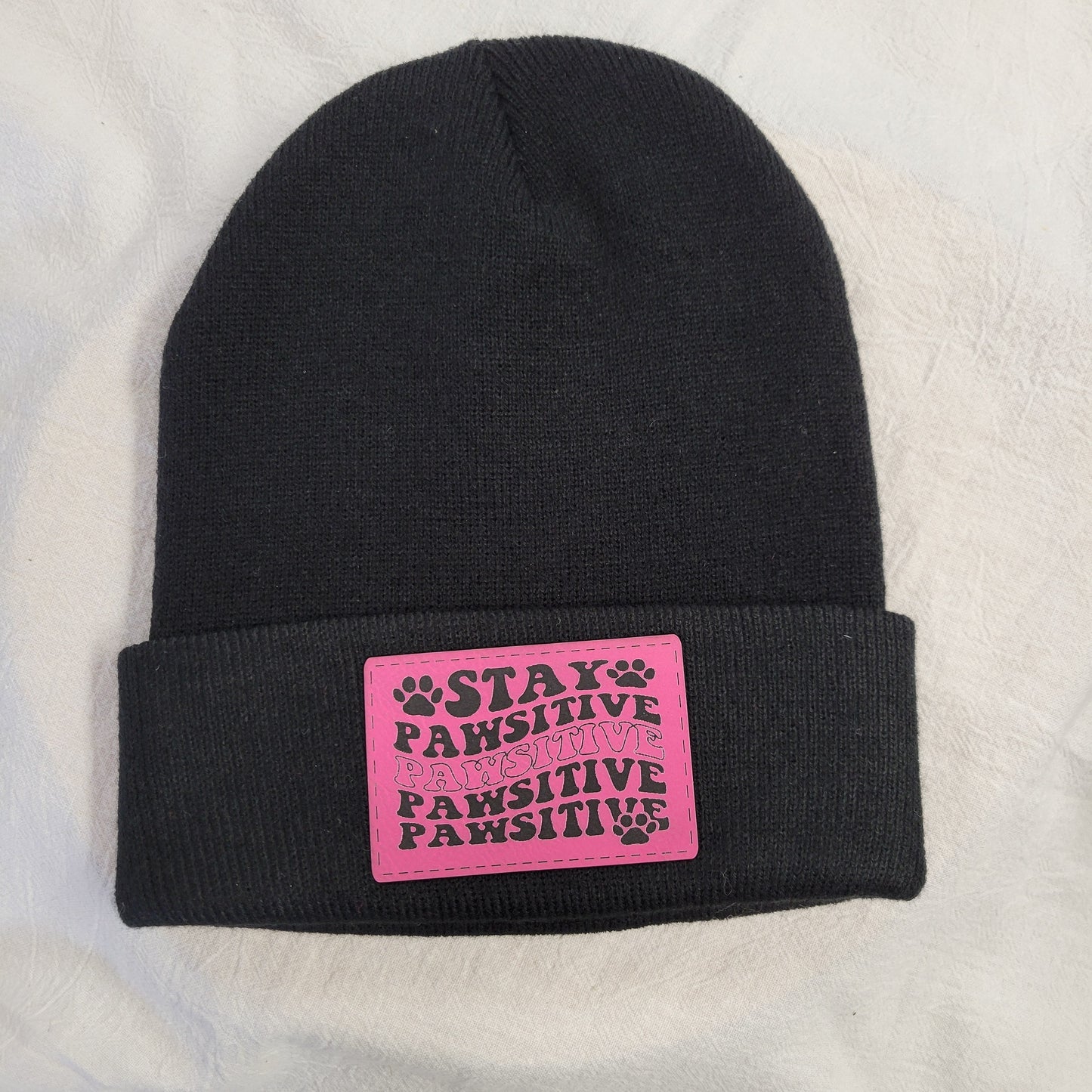 Beanies with pet quote patches