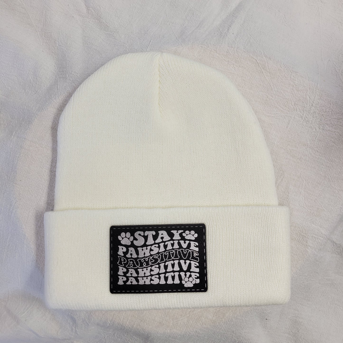 Beanies with pet quote patches