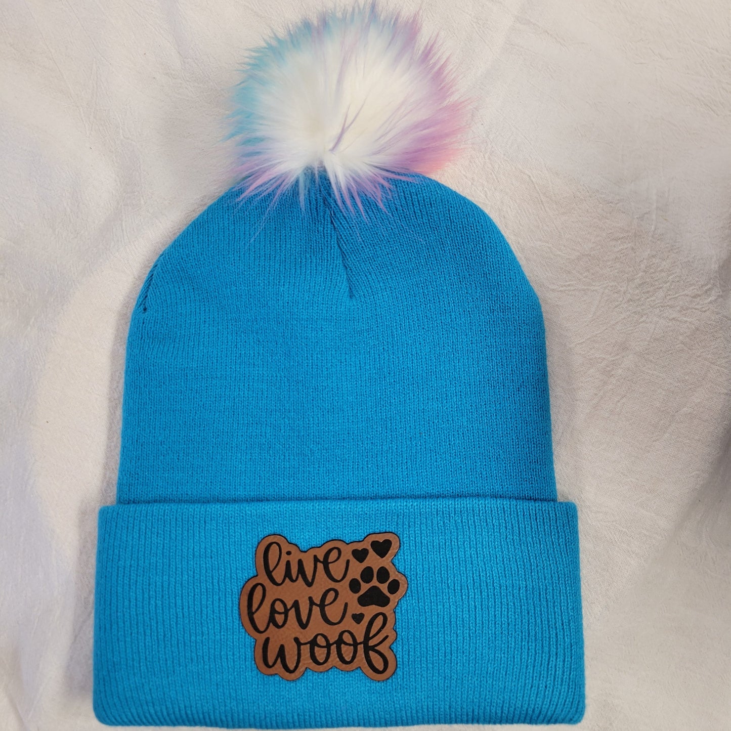 Beanies with pet quote patches