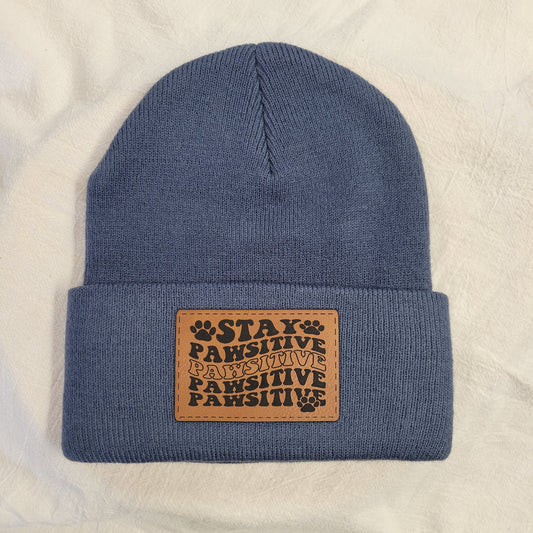 Beanies with pet quote patches