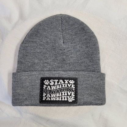 Beanies with pet quote patches