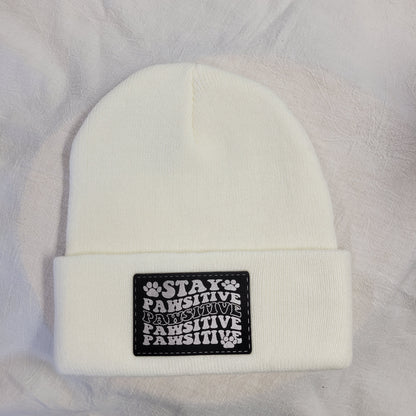 Beanies with pet quote patches